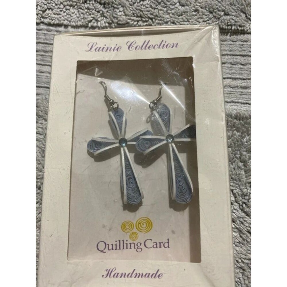 Blue swirl cross earrings